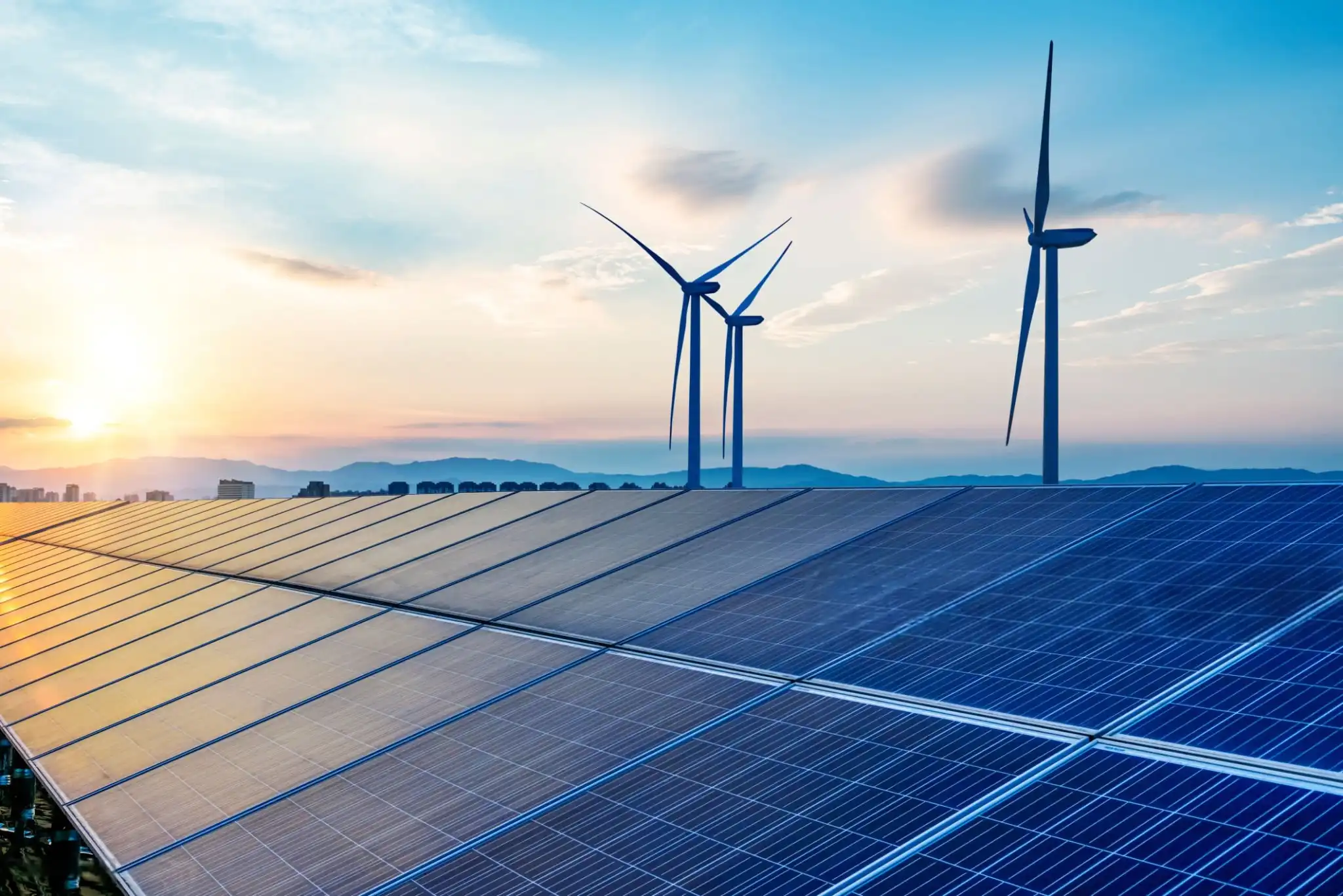 Renewable energy services banner showing solar panels and wind turbines